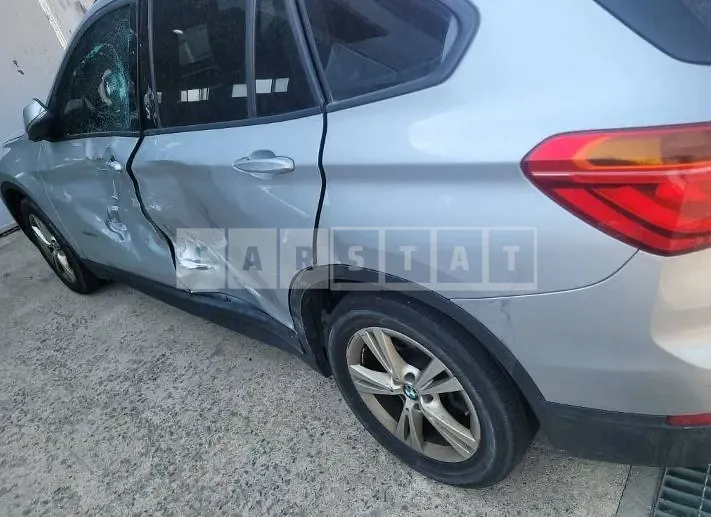 Photo 2 of 12: 2016 BMW X1 xDrive18d, VIN WBAHT9100G5F14781 — Korean insurance auction