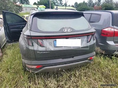 Photo 1 of 12: 2022 Hyundai Tucson, VIN KMHJE811BNU036035 — Korean insurance auction