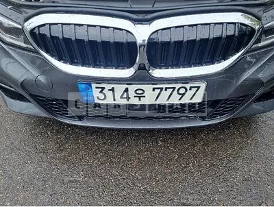 Photo 1 of 9: 2021 BMW 320i, VIN WBA5X5103MFL10463 — Korean insurance auction