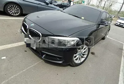 Photo 1 of 10: 2017 BMW 118d, VIN WBA1S5105HV806471 — Korean insurance auction