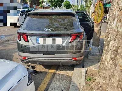 Photo 1 of 18: 2022 Hyundai Tucson, VIN KMHJC811BNU057190 — Korean insurance auction