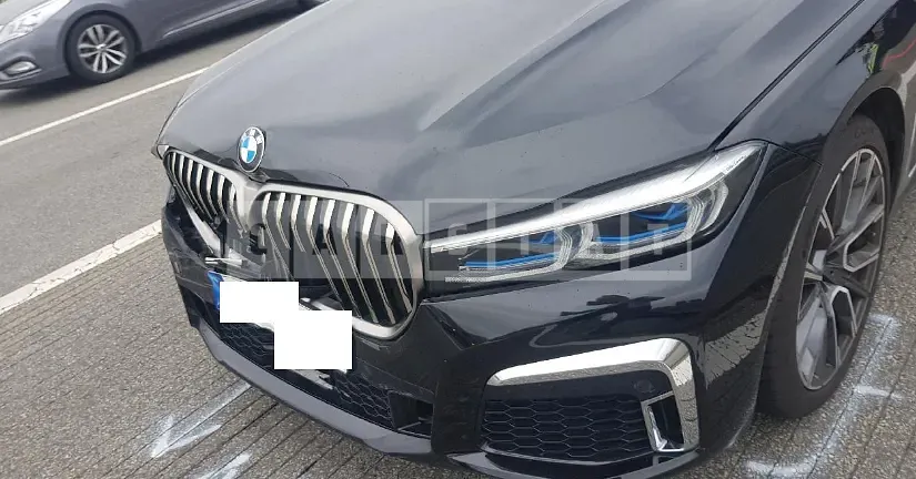 Photo 2 of 31: 2022 BMW 740d xDrive, VIN WBA7D2101NCH79945 — Korean insurance auction