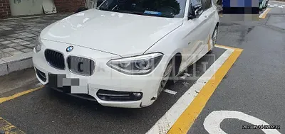 Photo 1 of 10: 2014 BMW 118d, VIN WBA1C1100FJ837122 — Korean insurance auction